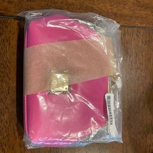 Dooney pink large kiss lock card holder